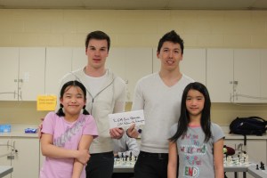 Sarah and Tiffany presenting the raised money.